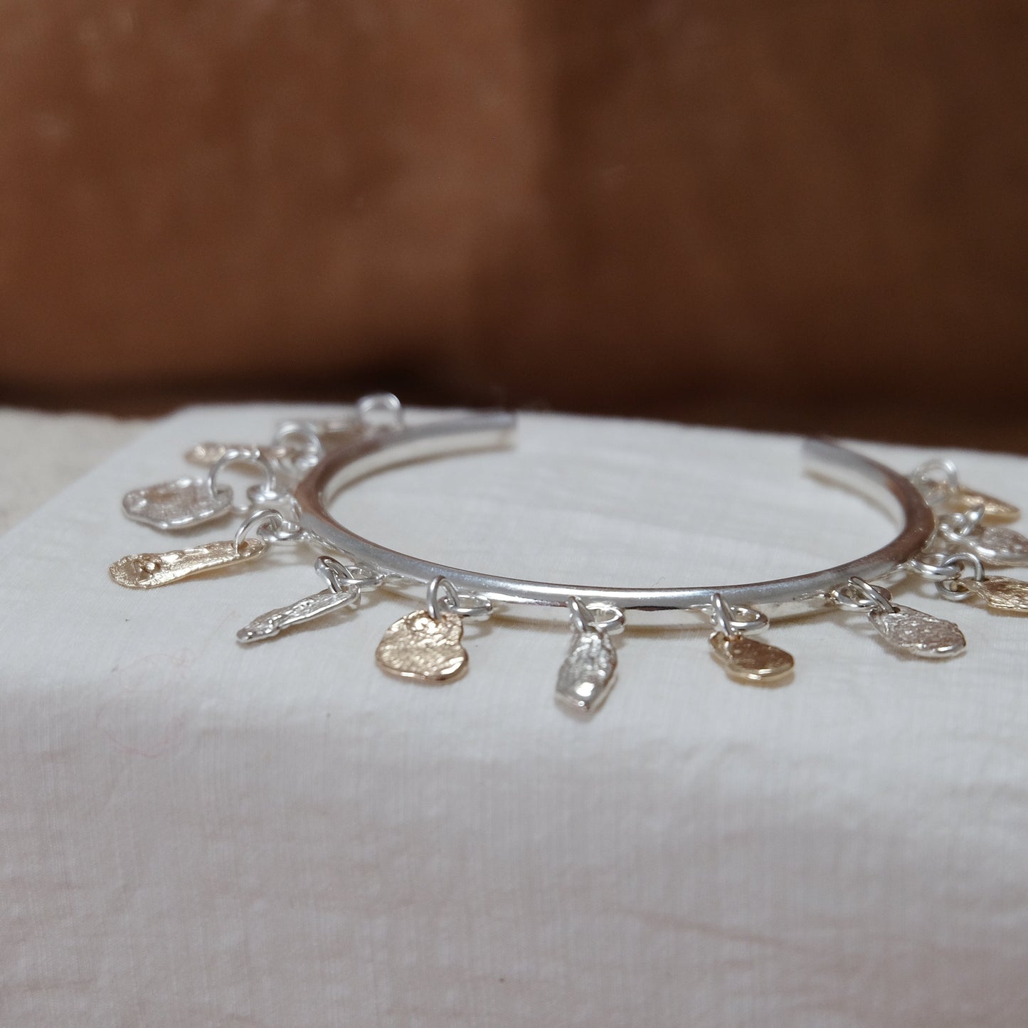 Charm rock bangle, Silver & Gold