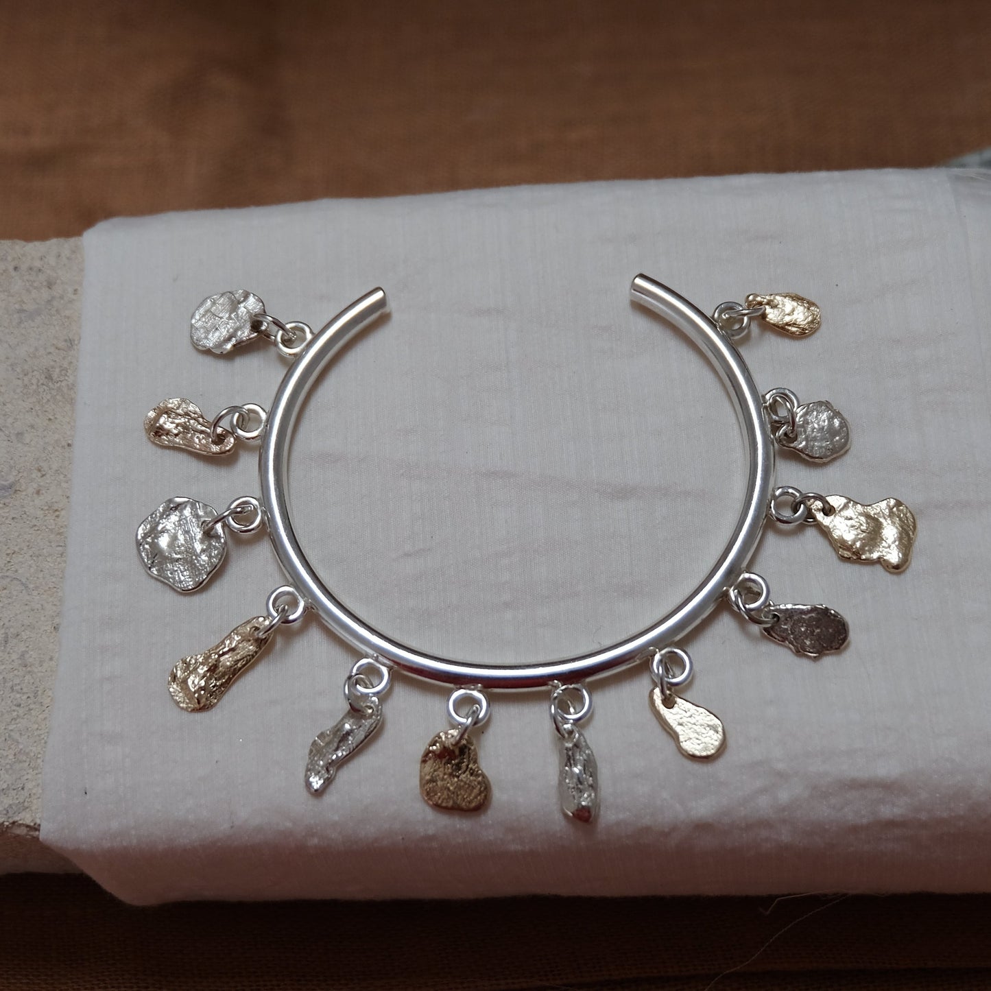 Charm rock bangle, Silver & Gold