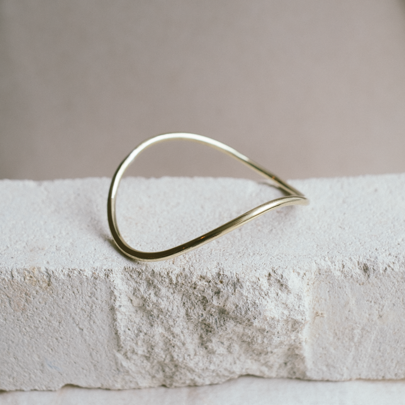 curved gold bangle