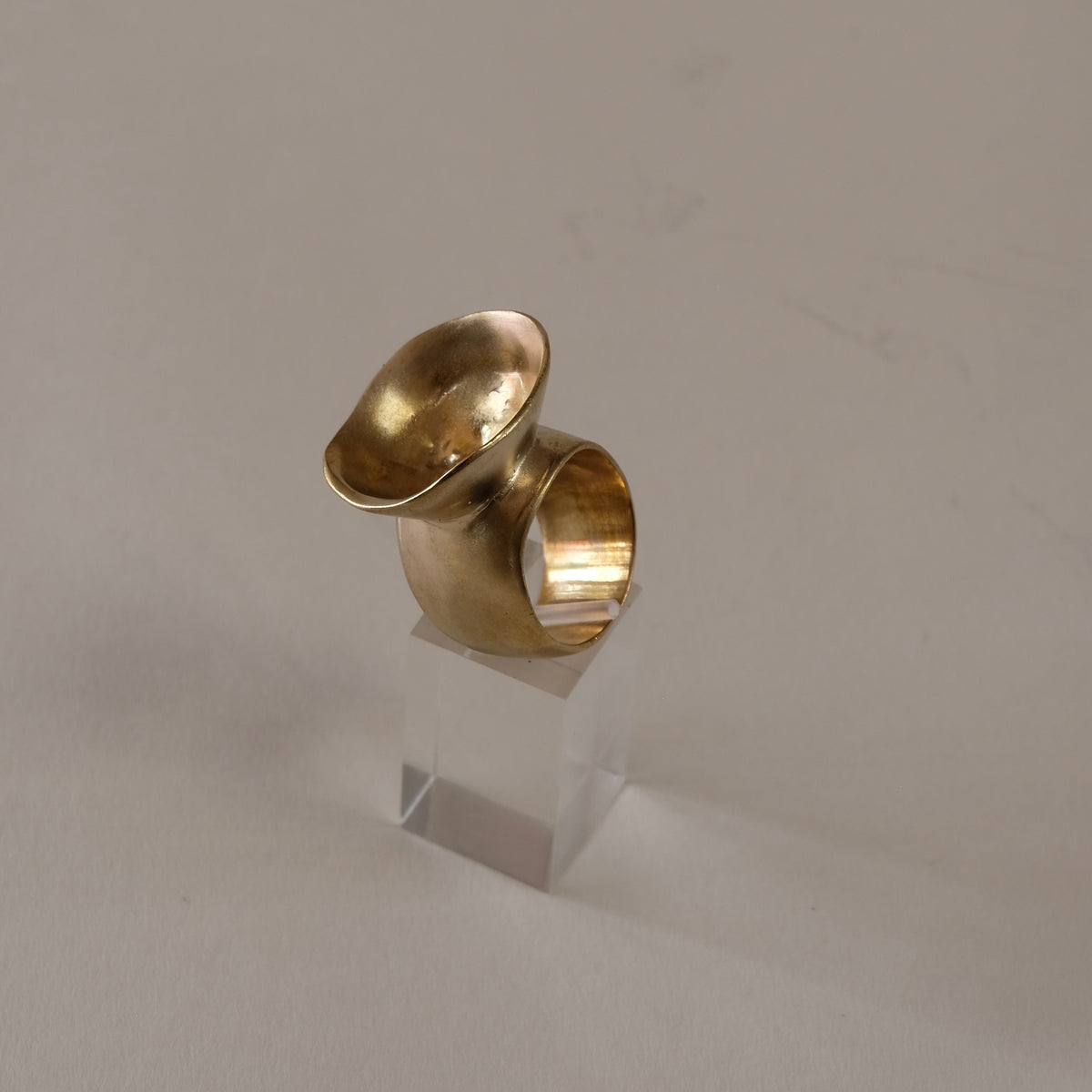 A brass sculptural ring , hand made ring designed and inspired by pebbles