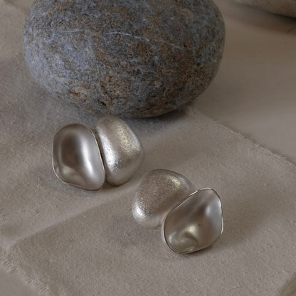 Silver hand formed statement lightweight earrings. Contemporary and ethical earrings 