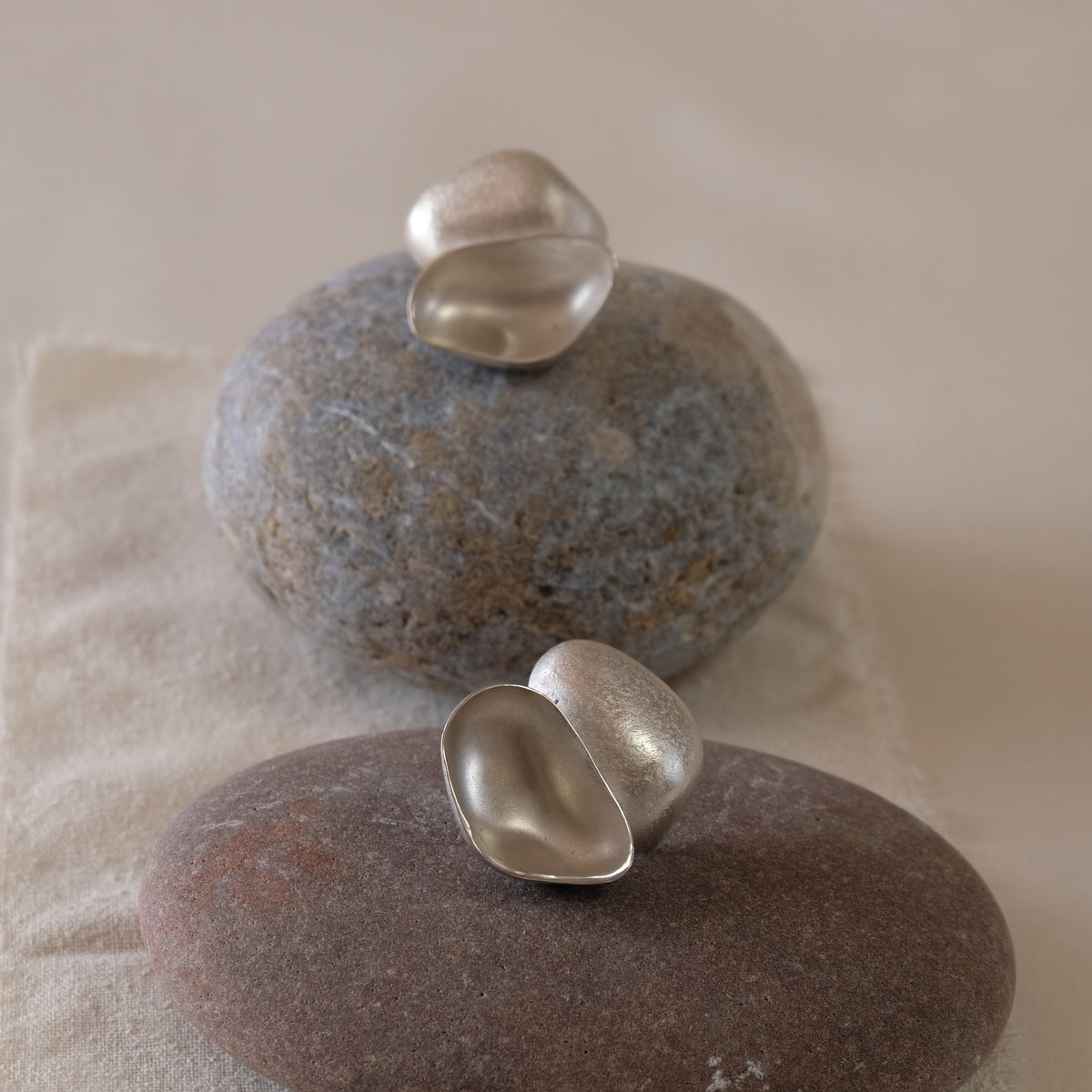 Handmade recycled silver contemporary earrings, dome shapes inspired by pebbles.