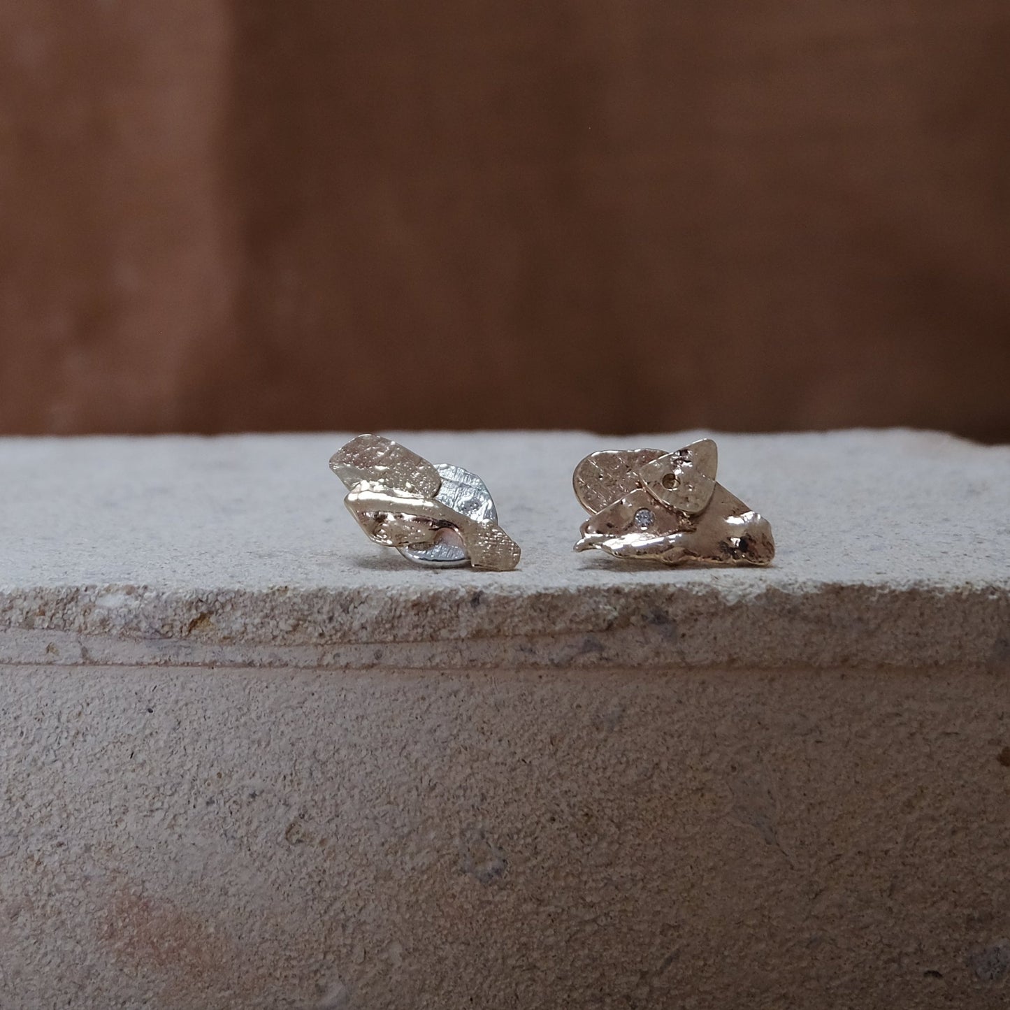 Gold & silver rock studs with ocean diamonds