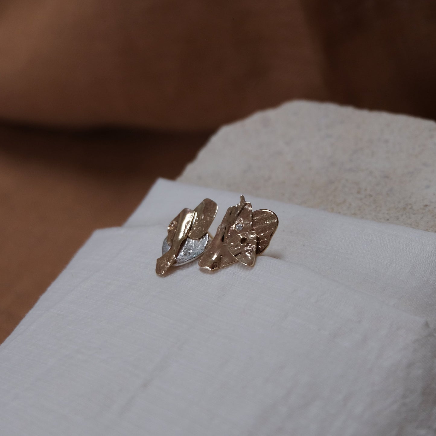 Gold & silver rock studs with ocean diamonds