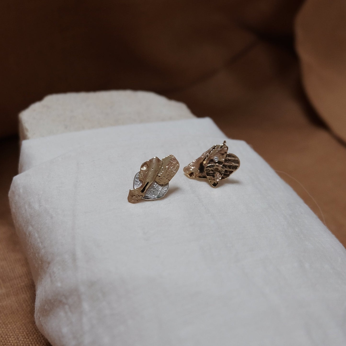 Gold & silver rock studs with ocean diamonds