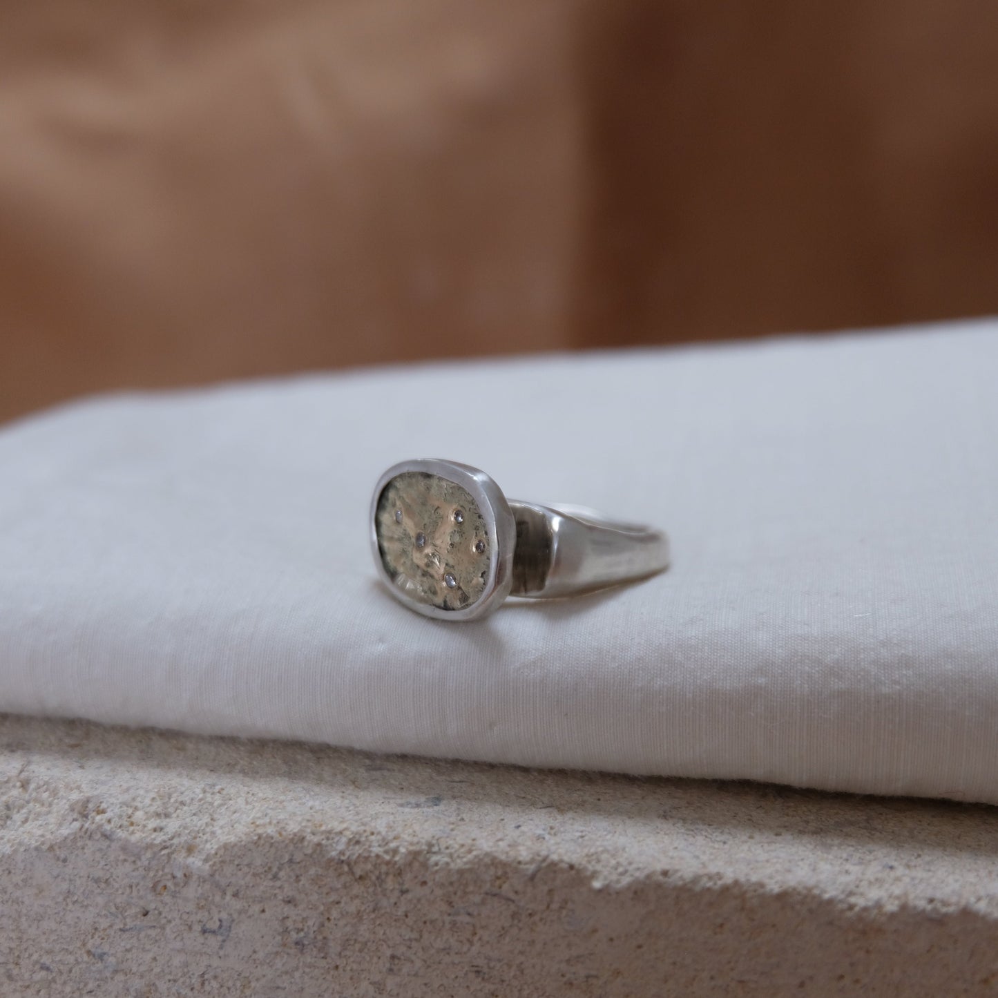 Ancient-Inspired Gold & Silver Rock Textured Ring with Ocean Diamonds