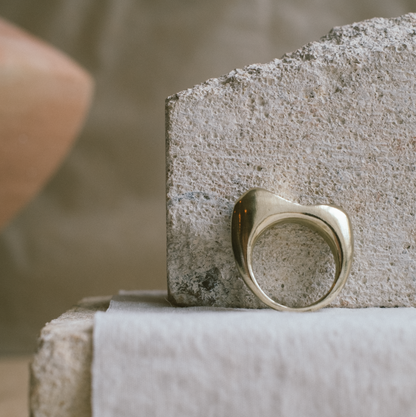 Curved brass sustainable ring