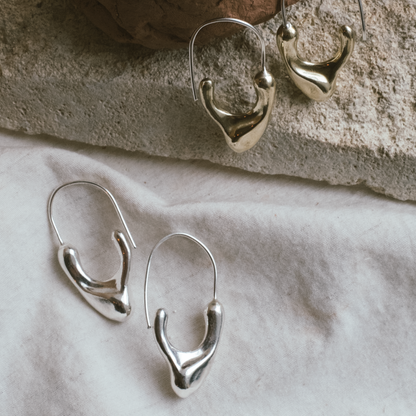 slump earrings